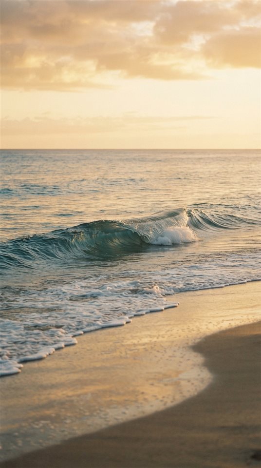 Cinematic film still of ocean waves, centered subject with a simple uncluttered composition, warm golden light, calm mood, 9:16 aspect ratio