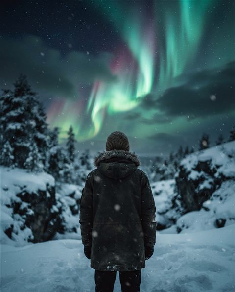 Cinematic film still of aurora borealis over a snowy landscape, close-up detail with shallow depth of field, moody dark tones, dramatic lighting, 4:5 aspect ratio