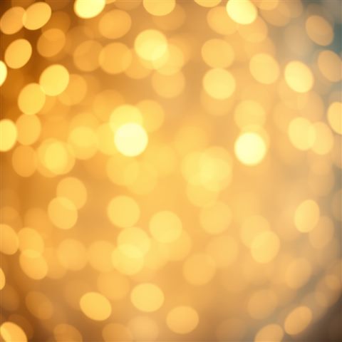 Photorealistic photo of A dreamy abstract background filled with soft, glowing golden and pastel light circles of various sizes., close-up detail with shallow depth of field, warm golden light, calm mood, 1:1 aspect ratio