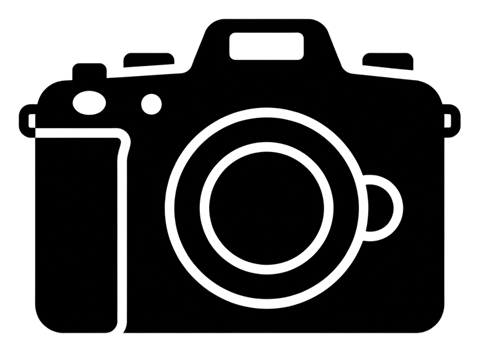Bold black glyph icon, solid filled silhouette of a photo camera icon, transparent background PNG