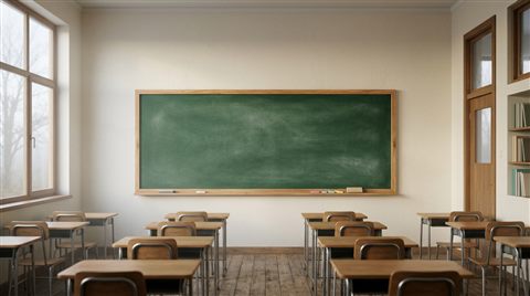 Photorealistic photo of a blank green chalkboard in a classroom, wide shot with open space at the top for text, misty morning haze, dreamy, 16:9 aspect ratio