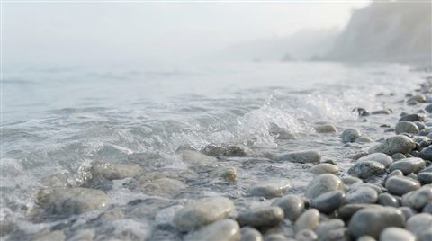 Soft 3D render of a calm wave touching a quiet pebble shore, close-up detail with shallow depth of field, misty morning haze, dreamy, 16:9 aspect ratio