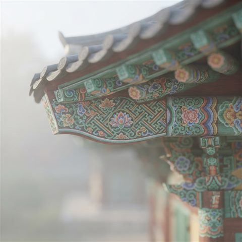 Soft 3D render of a seamless traditional Korean dancheong pattern in red, green and blue, close-up detail with shallow depth of field, misty morning haze, dreamy, 1:1 aspect ratio
