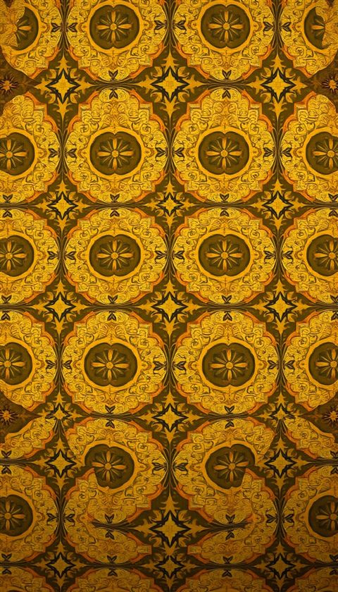 Cinematic film still of An elegant seamless traditional geometric pattern in muted gold and ivory tones., close-up detail with shallow depth of field, vivid colors, high contrast, energetic, 9:16 aspect ratio