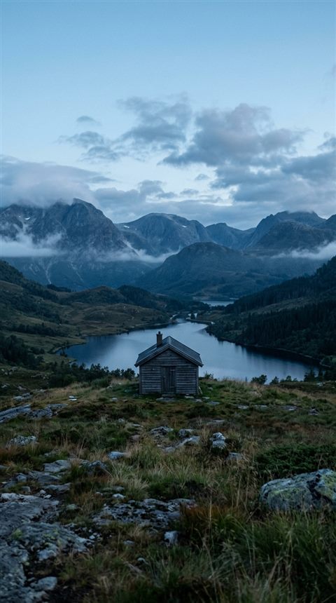 Cinematic film still of beautiful natural landscape, centered subject with a simple uncluttered composition, cool blue tones, quiet atmosphere, 9:16 aspect ratio