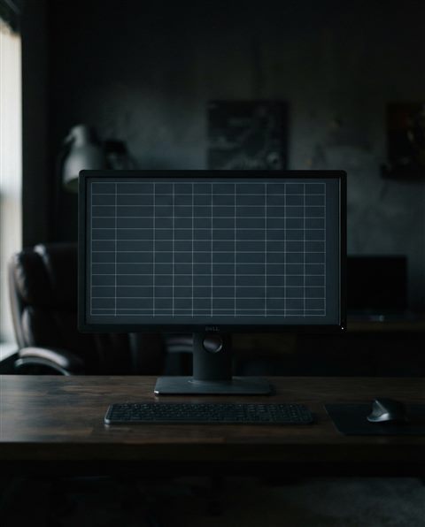 Photorealistic photo of a blank financial chart on a screen with grid lines, centered subject with a simple uncluttered composition, moody dark tones, dramatic lighting, 4:5 aspect ratio