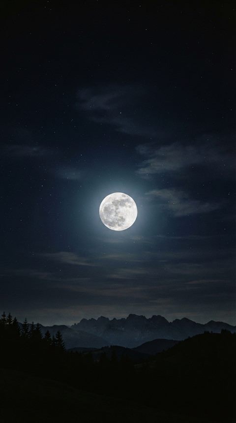 Cinematic film still of full moon in the night sky, centered subject with a simple uncluttered composition, vivid colors, high contrast, energetic, 9:16 aspect ratio
