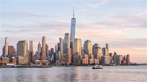 Photorealistic photo of the New York City skyline, centered subject with a simple uncluttered composition, soft pastel colors, bright and cozy, 16:9 aspect ratio