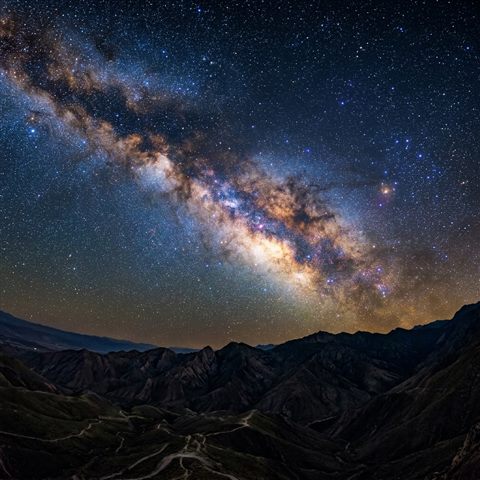 Photorealistic photo of starry night sky, high-angle view from above, vivid colors, high contrast, energetic, 1:1 aspect ratio
