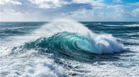 Photorealistic photo of ocean waves, centered subject with a simple uncluttered composition, vivid colors, high contrast, energetic, 16:9 aspect ratio
