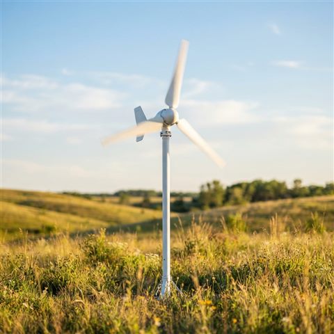 Photorealistic photo of small wind turbine blades spinning under bright sunlight, centered subject with a simple uncluttered composition, warm golden light, calm mood, 1:1 aspect ratio