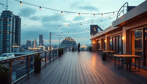 Photorealistic photo of An empty modern urban rooftop terrace with wooden flooring and string lights at twilight, close-up detail with shallow depth of field, warm golden light, calm mood, 16:9 aspect ratio