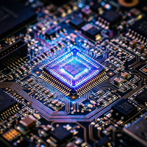 Photorealistic photo of a glowing microchip on a circuit board, close-up detail with shallow depth of field, vivid colors, high contrast, energetic, 1:1 aspect ratio