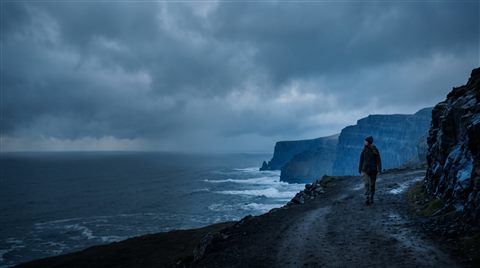 Cinematic film still of bold dramatic background with empty space on the left half for a person and a title, centered subject with a simple uncluttered composition, cool blue tones, quiet atmosphere, 16:9 aspect ratio
