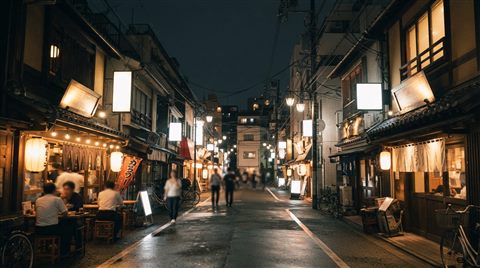 Photorealistic photo of a Tokyo street at night, wide shot with open space at the top for text, warm golden light, calm mood, 16:9 aspect ratio